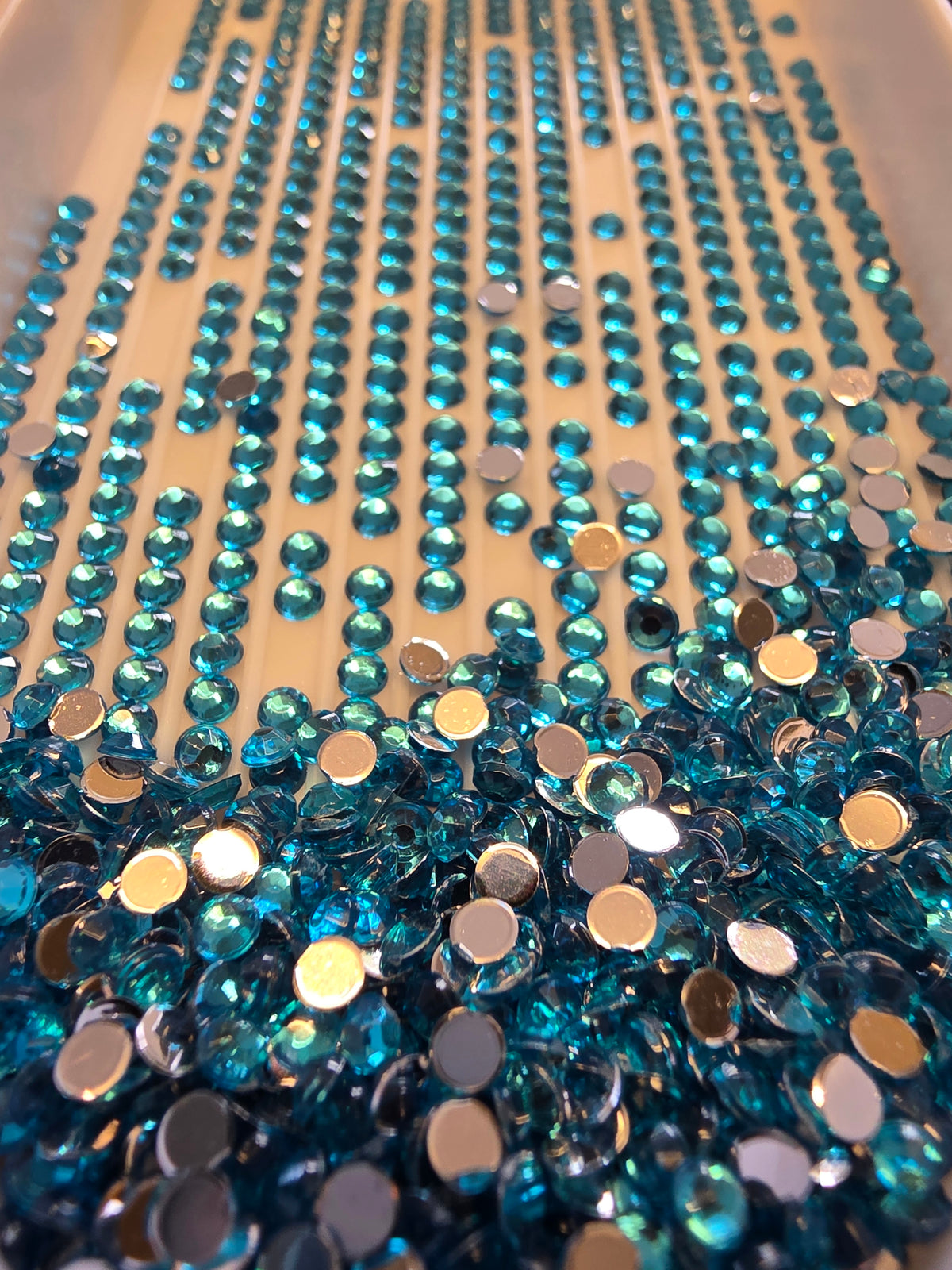 Round crystal diamond painting drills by Silaba Crafts, showcasing sparkling beads for diamond art projects.